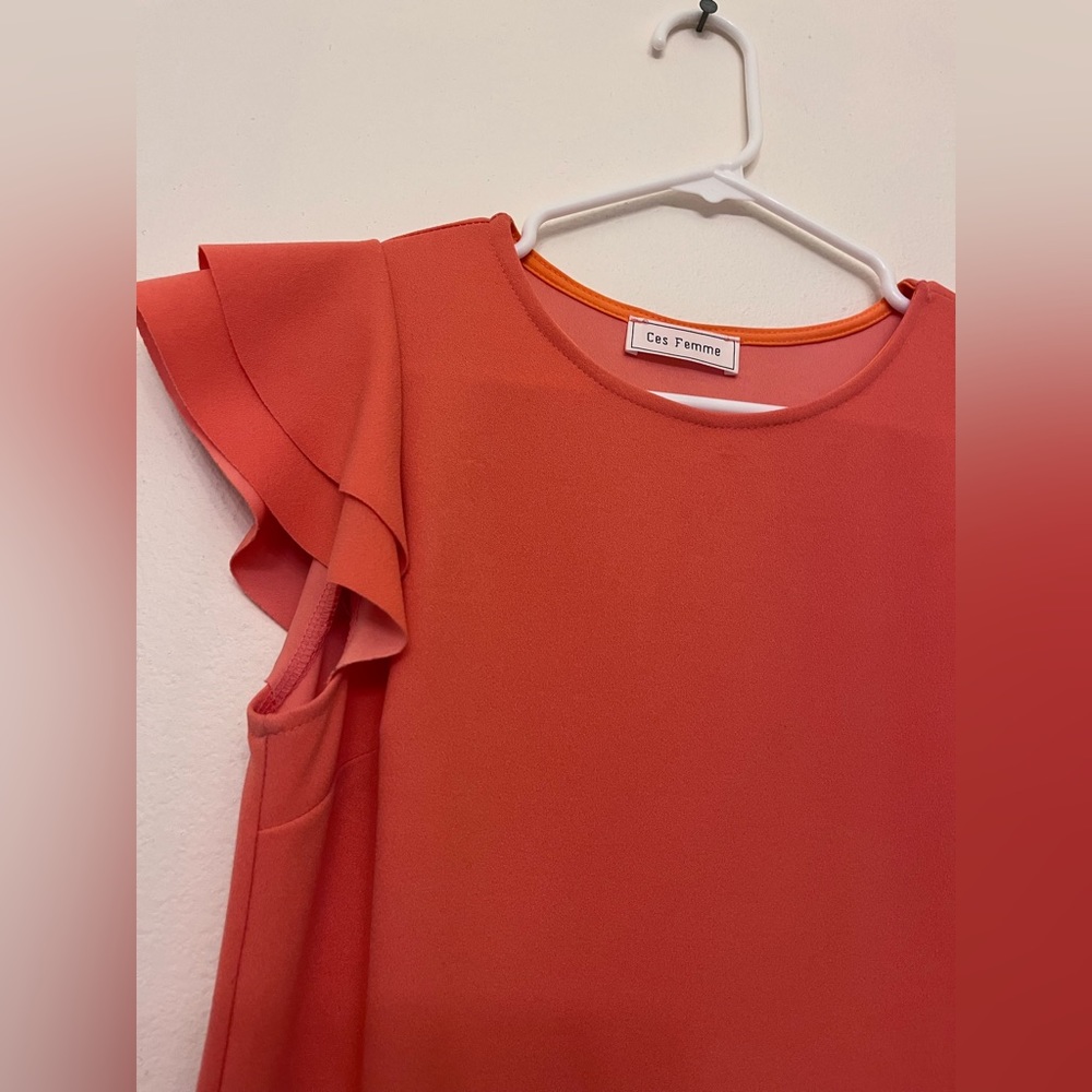 Coral mini dress with ruffle sleeves